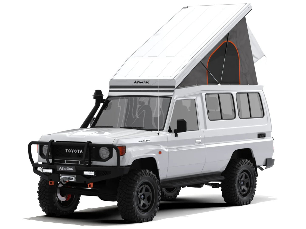 Alu-Cab Hercules roof conversion, white, open on a Toyota Land Cruiser 78 Troopy