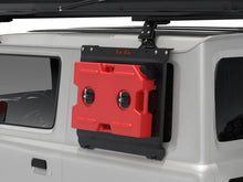 Alu-Cab Jimny 10L red fuel jerry can on the exterior molle plate of a Jimny 3-door, render