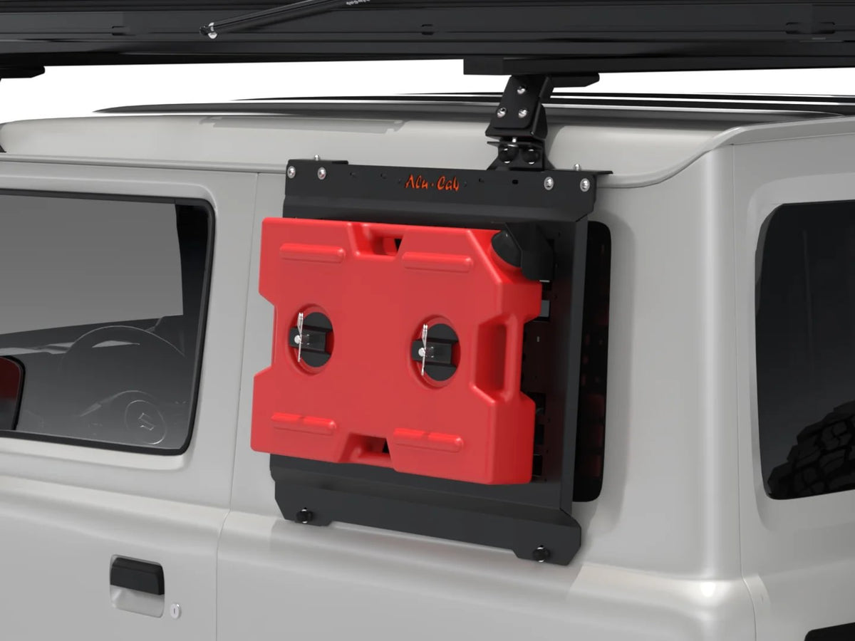 Alu-Cab Jimny Jerry Can Mount holding a red jerry can on a Jimny 3-door, render