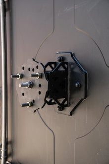 Alu-Cab spare wheel mount on the rear door, front view of the stud plate