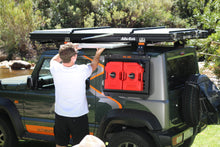 Alu-Cab LT-50 roof table slide extended under the tent