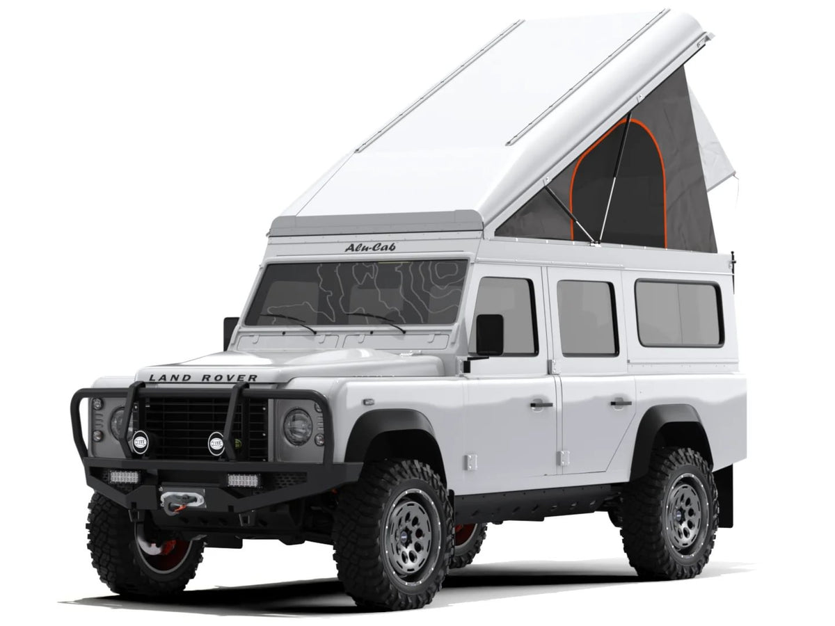 Alu-Cab Icarus roof conversion, white, open on a Land Rover Defender 110
