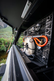Alu-Cab recovery kitting grid inside a canopy cupboard, portrait view