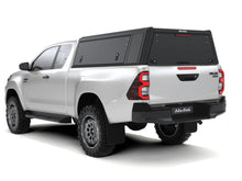 Alu-Cab Guard Canopy rear view (solid, windowless rear door) on Toyota Hilux Revo Xtra Cab