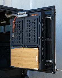 Alu-Cab ModCAP rear door MOLLE plates with fold-down table
