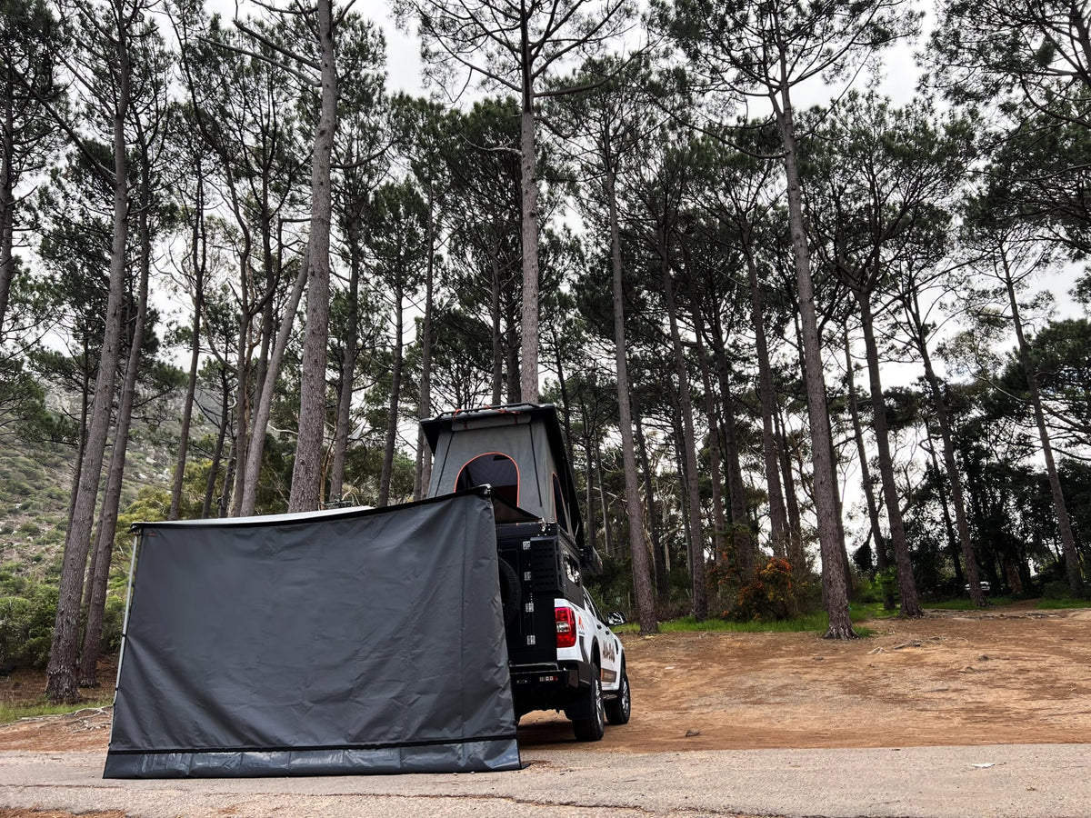 Alu-Cab Universal Side Panel hanging from a Shadow Awning