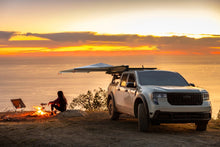 Alu-Cab 270 Shadow Awning 2.0m on a Ford Maverick at a sunset camp