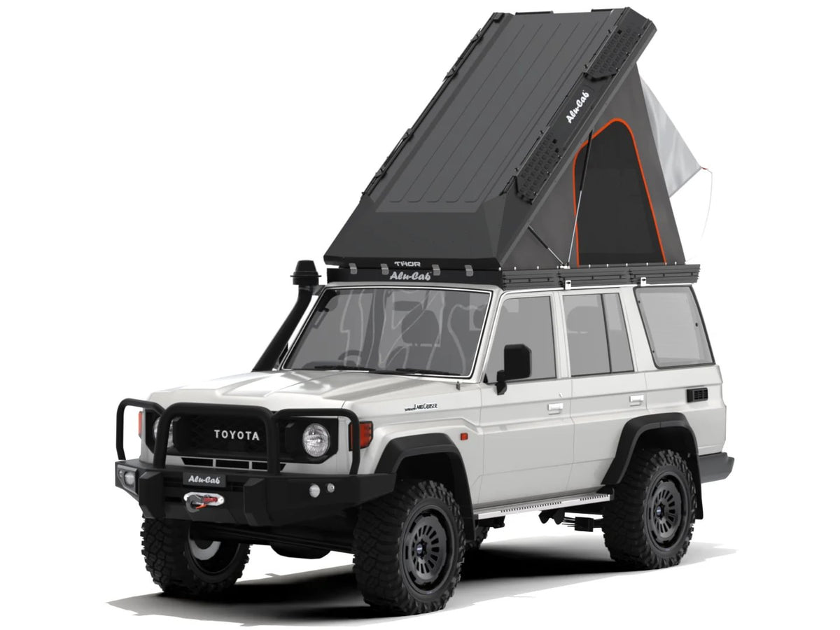 Alu-Cab Thor roof conversion open on a Toyota Land Cruiser 76