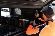 Alu-Cab Ammo Box (low lid) opened inside a canopy, gear inside