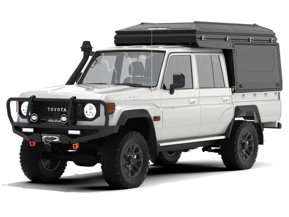 Alu-Cab ModCAP Family tent mounting kit fitted between Family tent and ModCAP base on a Toyota Land Cruiser 79 double cab