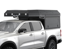 Alu-Cab ModCAP Camper tent on a double cab base showing the front filler brackets under the tent