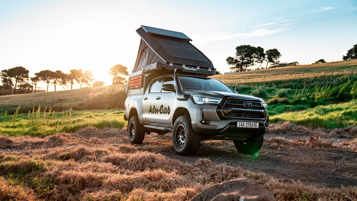 Alu-Cab ModCAP Camper on a Toyota Hilux: the camper this fit kit mounts, not the fit kit itself