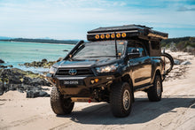 ModCAP with 4-sleeper Family Camper Tent on the beach (Toyota Hilux double cab shown)
