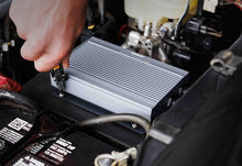 Renogy REGO IP67 12V 50A DC-DC Battery Charger with MPPT & Bluetooth — installed in an engine bay