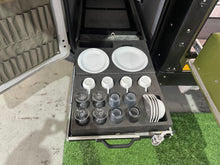 Cutlery and crockery set in the fridge-slide compartment