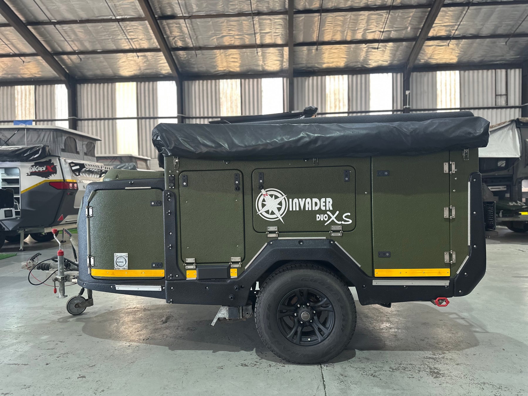 2023 Invader Duo XS off-road camper side profile with branding