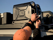 Front Runner fuel jerry can mounted on a vehicle
