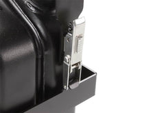 Front Runner vertical jerry can holder in use