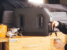 Front Runner water tank in use at camp