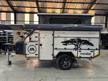 Metalian M42 off-road caravan, pop-top roof raised, side profile