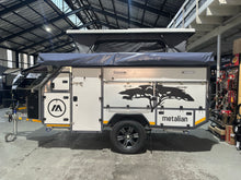 Metalian M42 off-road caravan, front three-quarter view with pop-top roof up
