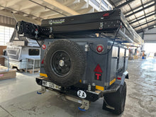 Rear of the Metalian Maxi showing the rear bar, spare-wheel bracket and BunduTop hardshell rooftop tent