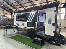 2026 Nayela Bateleur demo unit – side view with Bateleur branding and slide-out kitchen deployed