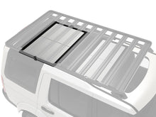 Front Runner Pro Stainless Steel Camp Table Kit mounted under a Slimline II roof rack