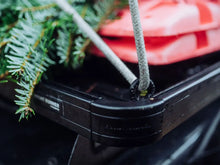 Tie down rings securing gear