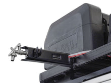Tap extension bracket mounted on rack