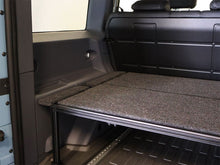 Front Runner Ineos Grenadier Storage System fitted in a Grenadier load area, photo 4