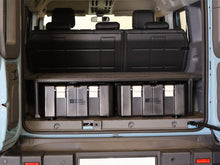 Front Runner Ineos Grenadier Storage System fitted in a Grenadier load area, photo 6