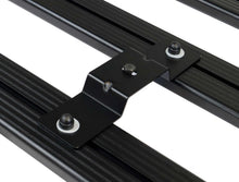 Tent mount brackets on a roof rack