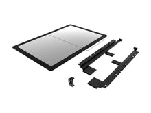 Stainless steel tabletop and black powder-coated aluminium frame detail