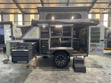 2023 Tuff Cats Mbada 2 Max – side view with pop-up roof raised and lockers open
