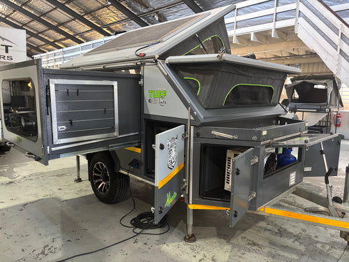2023 Tuff Cats Mbada 2 Max – front three-quarter view with roof solar panel and slide-out bed