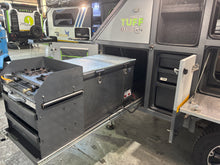 2023 Tuff Cats Mbada 2 Max – slide-out kitchen with 2-plate gas burner and National Luna fridge